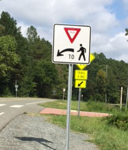 New Pedestrian Signs at O'Kelly Chapel Crossing